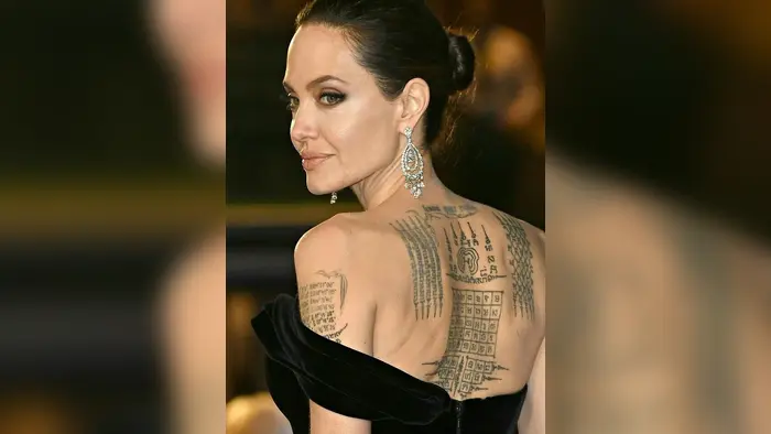 angelina jolie arkasındaki dövmeler neyi anlatıyor